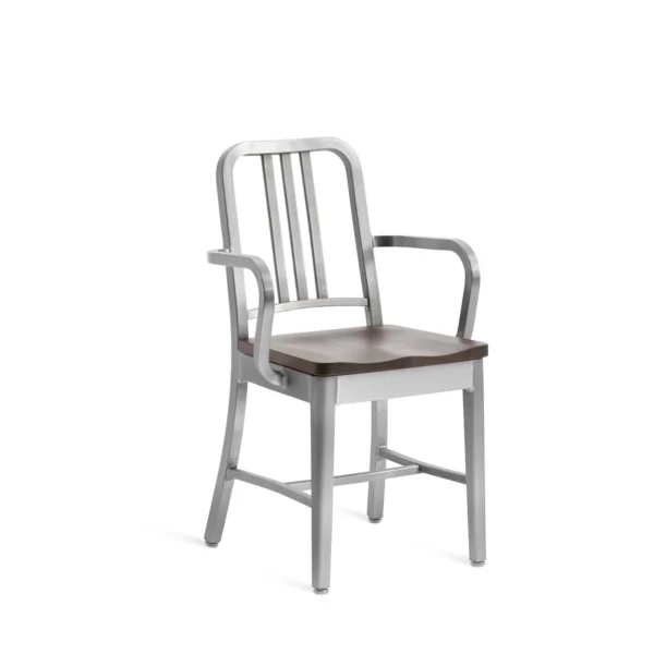 1104 Navy Armchair by Emeco, a timeless and durable design inspired by naval architecture, offering comfort and style for contemporary living rooms and commercial spaces.