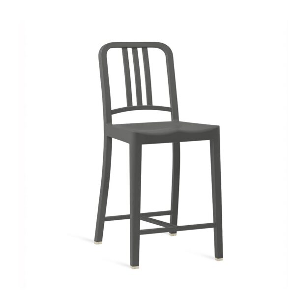 “High-performance 111 Navy Stool by Emeco, redefining classic design with green innovation.”
