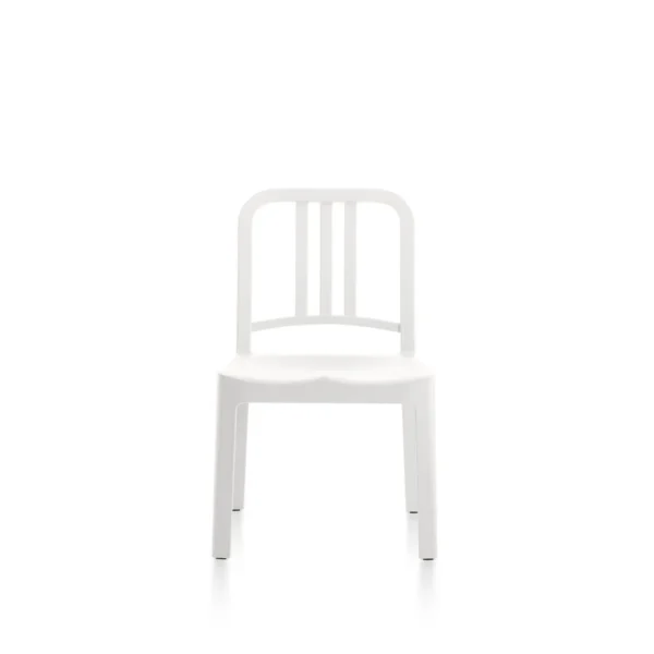 111 Navy Mini Chair Snow by Emeco, made from recycled PET plastic, features a curved backrest and concave seat, suitable for indoor and outdoor use.