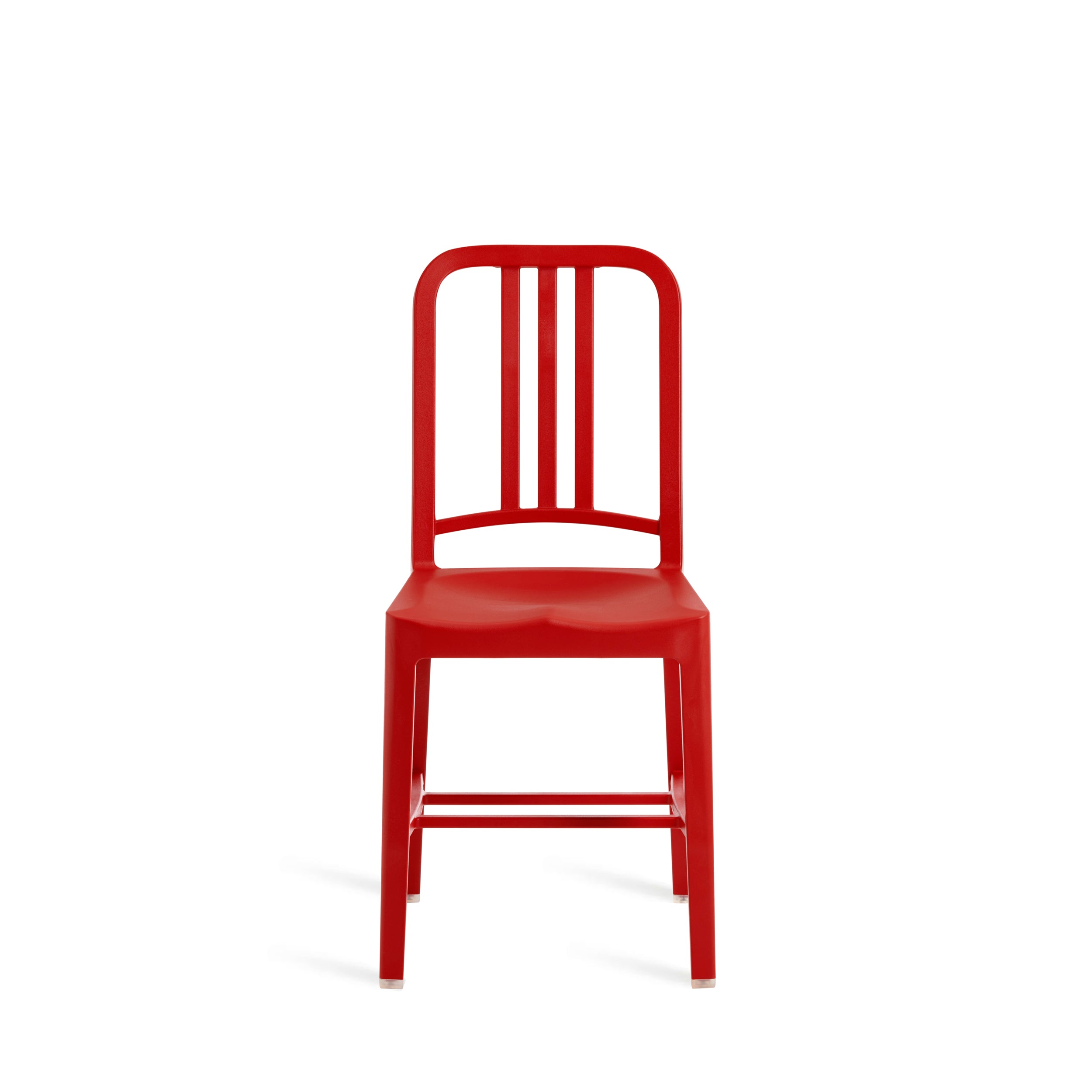 Emeco 111 Navy Chair in snow white, made from recycled plastic bottles, featuring sleek, minimalist design.
