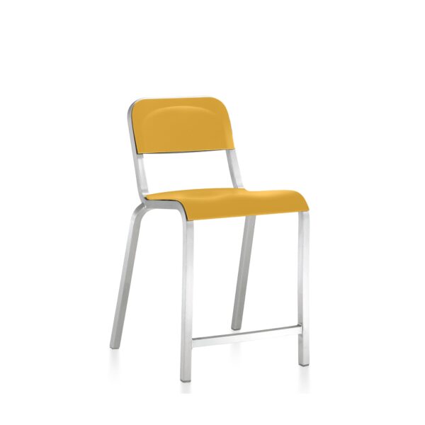 “Retro-inspired Emeco 1951 stool with aluminum base and colorful seat.”