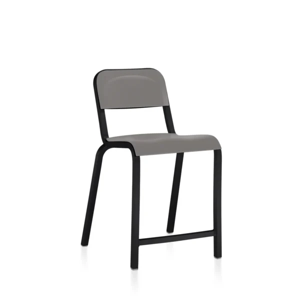 1951 Stool in Flint Grey with black powder-coated aluminum frame by Emeco, designed by Adrian van Hooydonk, features a minimalist design suitable for both indoor and outdoor use.