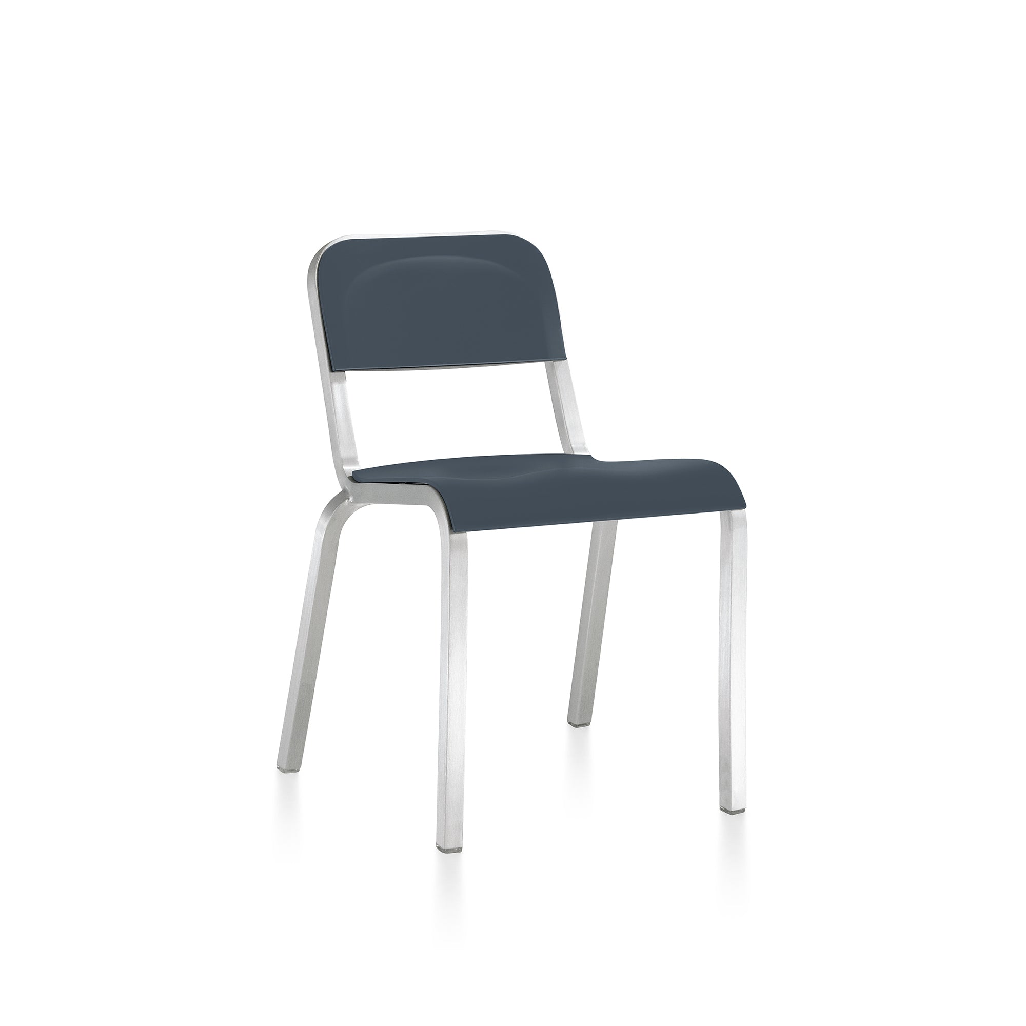 “Durable and playful 1951 Chair by BMW for Emeco with anodized aluminum base and ergonomic molded seat.”