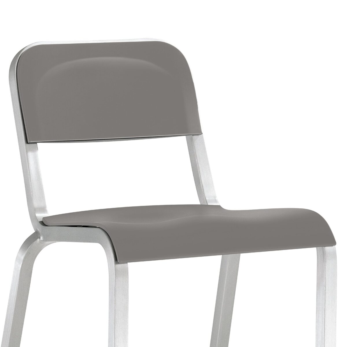 Minimalist 1951 stacking chair with a contoured recycled plastic seat and hand-brushed aluminum base by BMW for Emeco.
