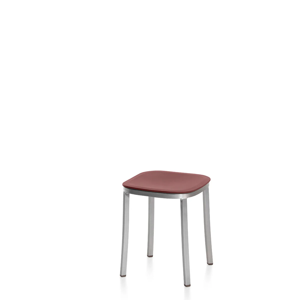 1 Inch Small Stool by Emeco, designed by Jasper Morrison, features a recycled aluminum frame and a seat made from 100% reclaimed polypropylene, available in various colors, suitable for both indoor and outdoor use.