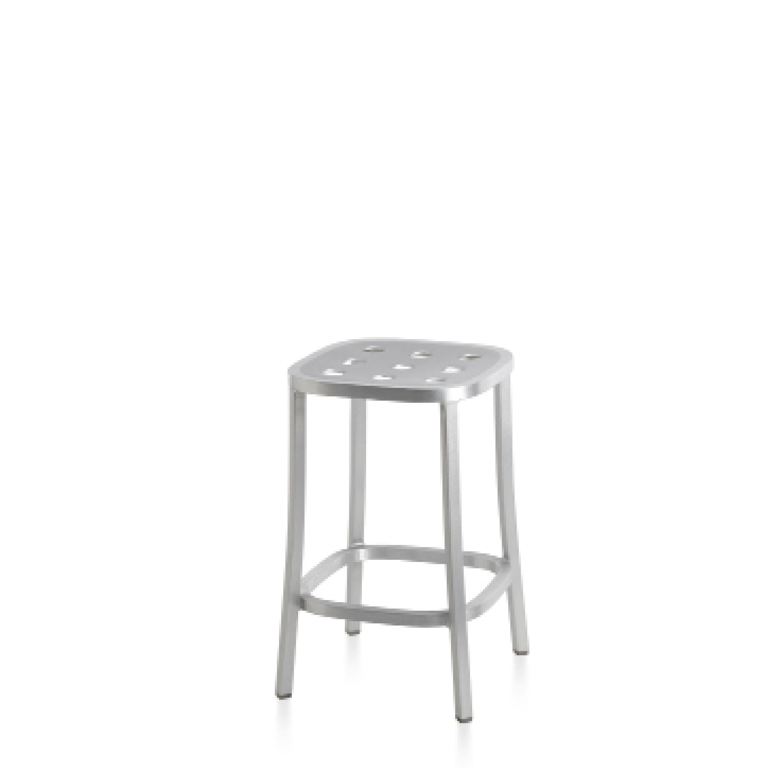 “Emeco 1 Inch All Aluminum Stool offering strength, simplicity, and sustainable design in a compact form.”