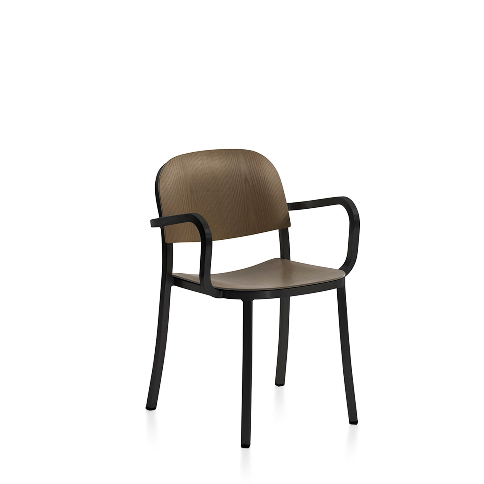 “Jasper Morrison-designed 1 Inch Armchair with ergonomic wood seat by Emeco.”