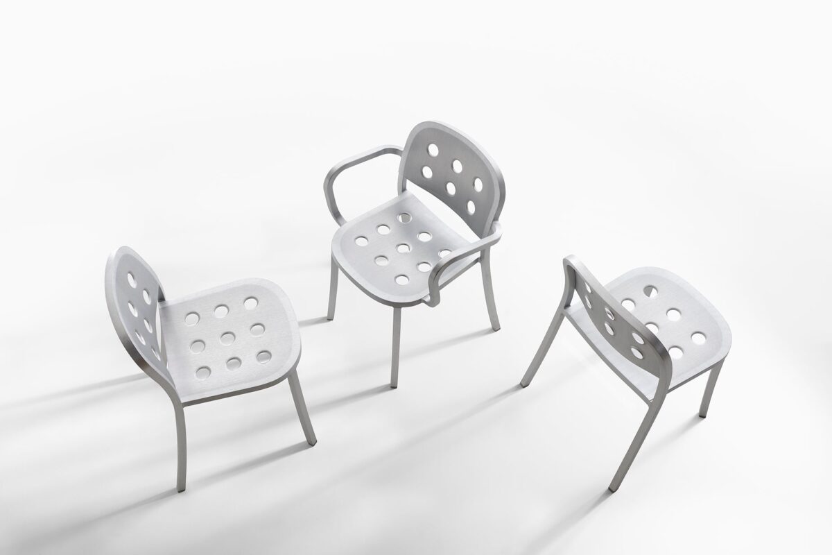 Perforated aluminum seat and backrest chair, designed by Jasper Morrison for Emeco, offering sustainable design with durability and modern appeal.
