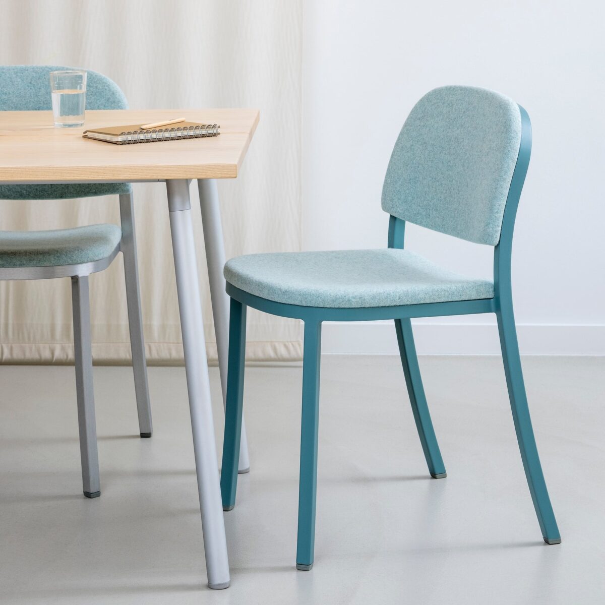 Modern 1 Inch Side Chair by Jasper Morrison, upholstered for added comfort.