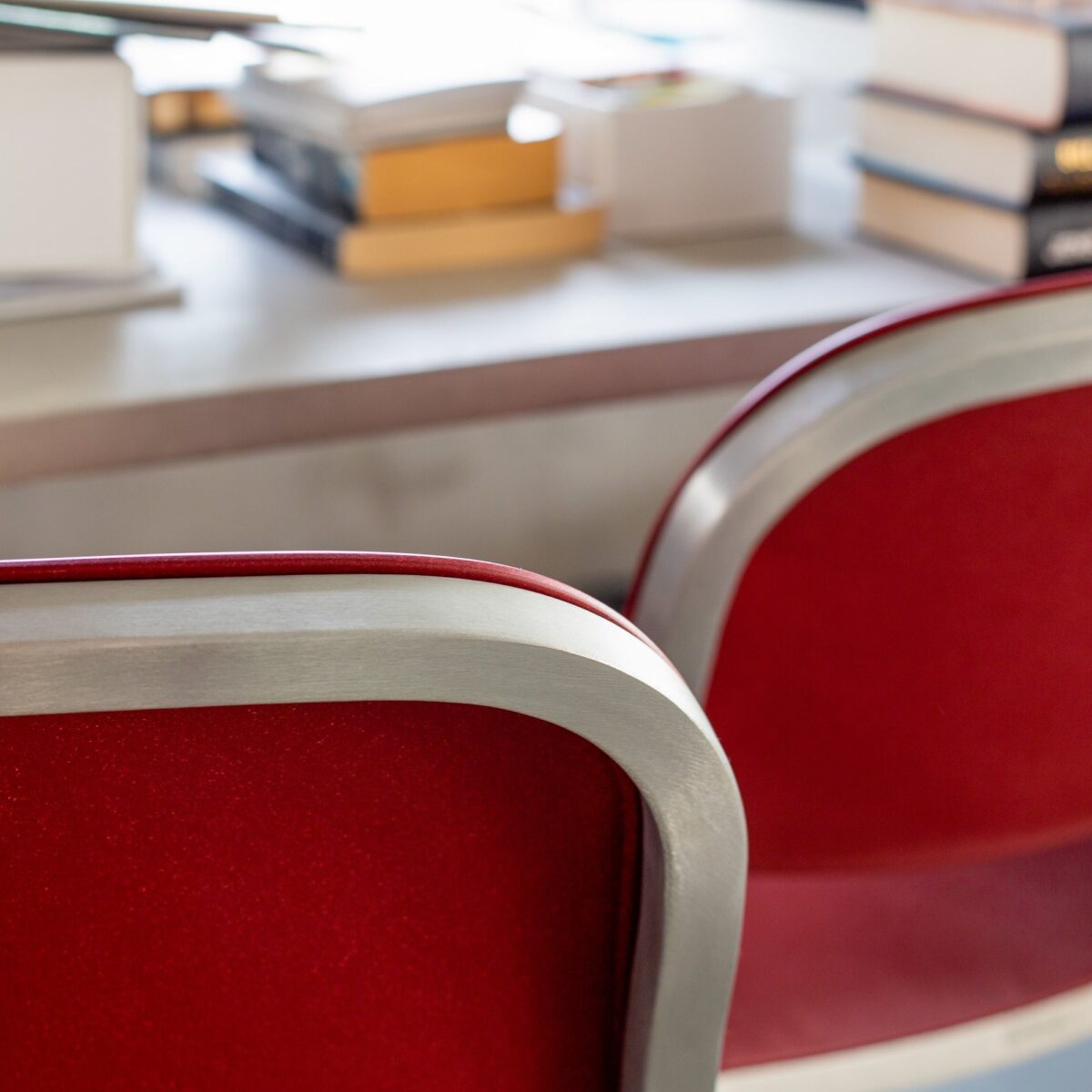 vvv“Sustainable 1 Inch Side Chair with a contoured plastic seat and stackable metal frame.”