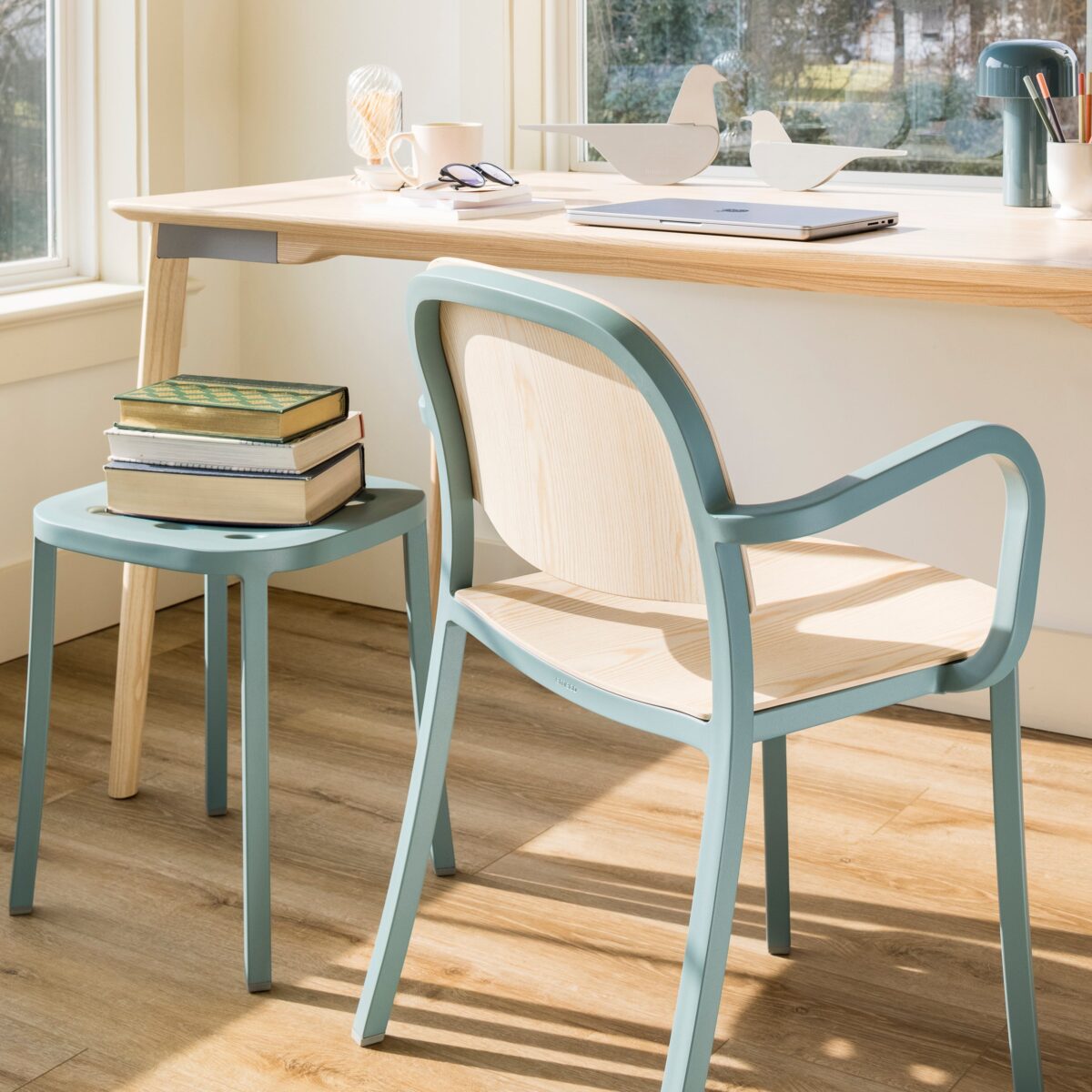 “Sustainable 1 Inch Armchair by Emeco combining warm wood and lightweight structure.”