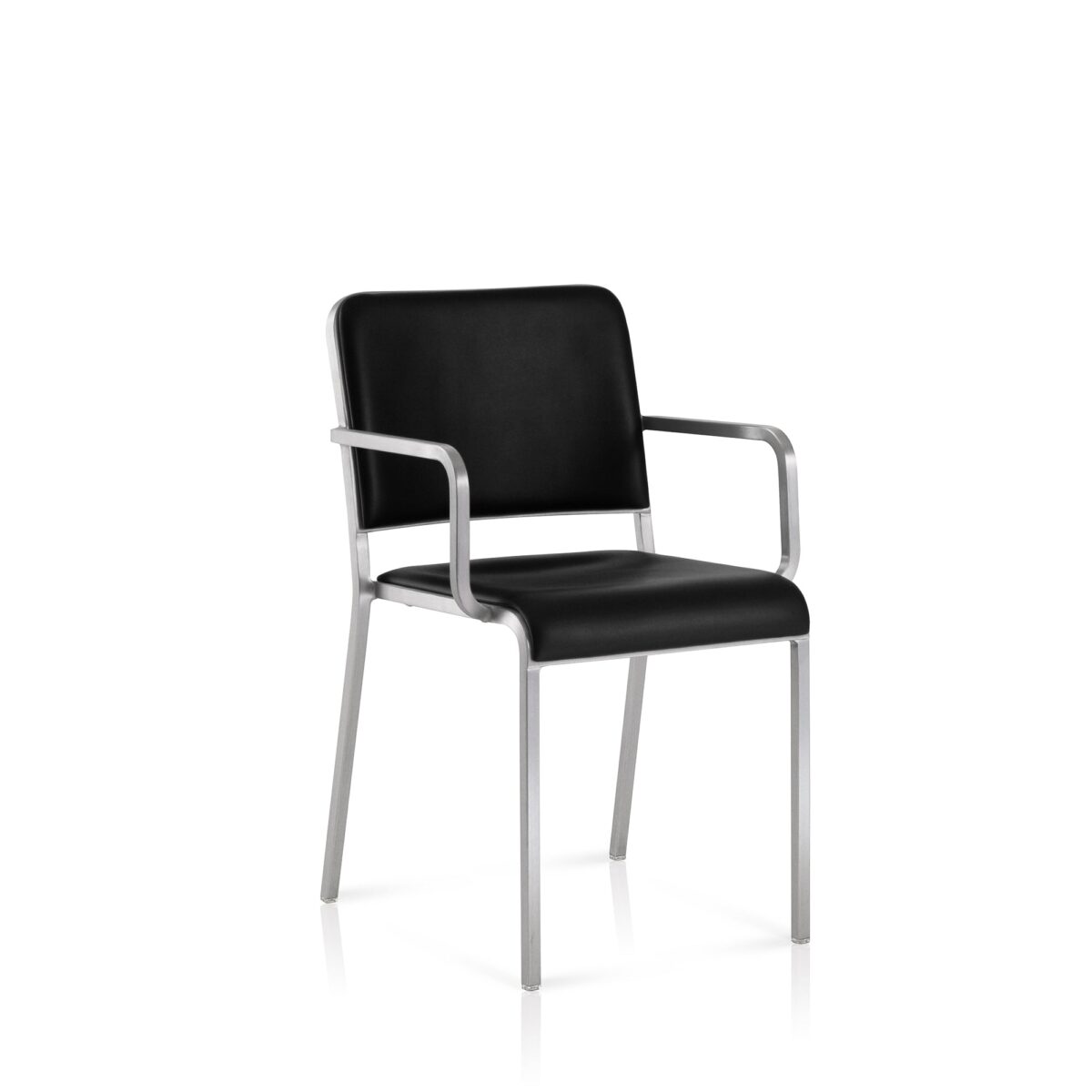 “Lightweight yet sturdy 20-06 Armchair with aluminum frame and upholstered seat, designed by Norman Foster.”