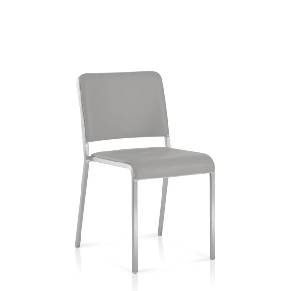 Close-up of a padded seat cushion designed for the Emeco 20-06 chair, featuring a sleek, contoured form that complements the chair's minimalist aluminum frame.