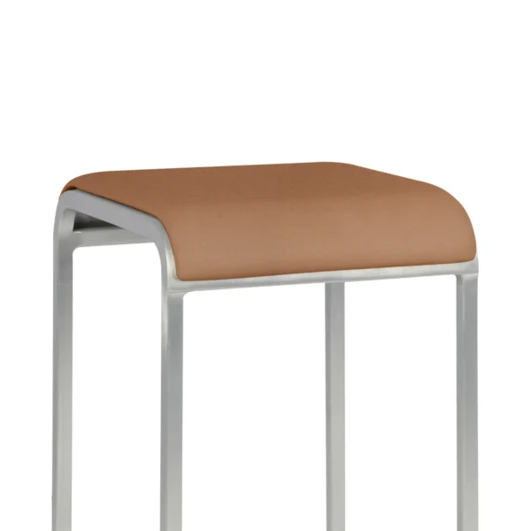 Seat pad for 20-06 stool in Spinneybeck Volo Tan leather by Emeco, designed by Norman Foster, provides comfort and style for the 20-06 stool, suitable for both indoor and outdoor use.