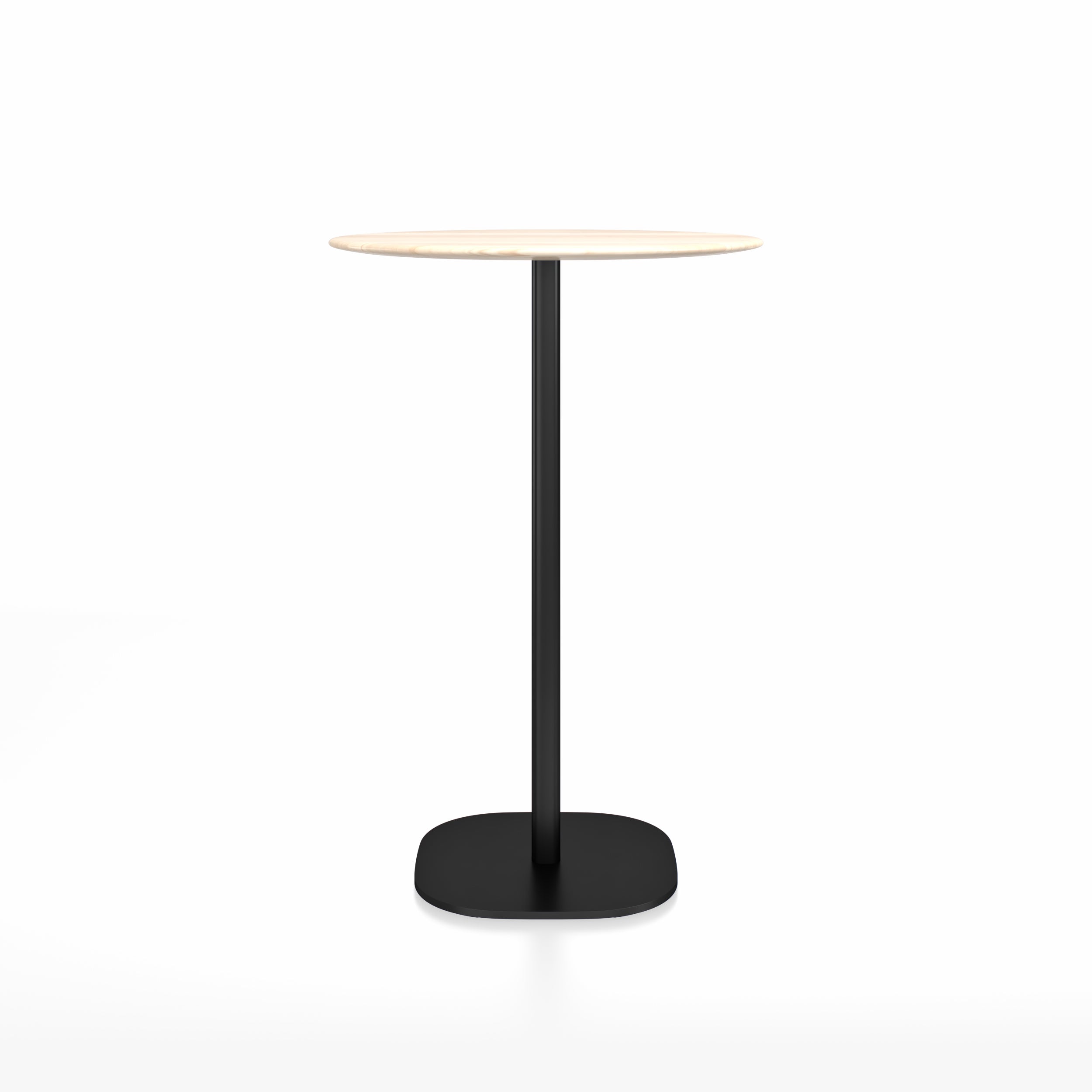 “Minimalist 2 Inch bar-height table by Emeco, round top with sturdy base.”