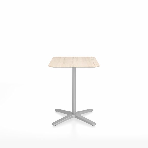 Modern square café table with an X base, designed by Jasper Morrison for Emeco. Features a minimalist aluminum base and various tabletop options.