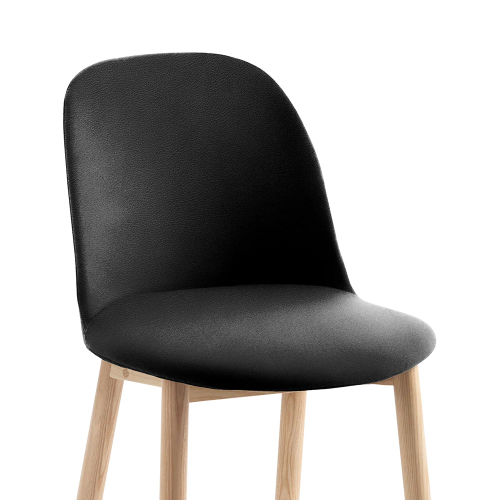 Alfi Soft Slipcover High Back in black leather by Emeco, designed by Jasper Morrison, features a structured foam cushion that slips over the seat and fits tightly, suitable for both high and low seat back Alfi chairs and stools.