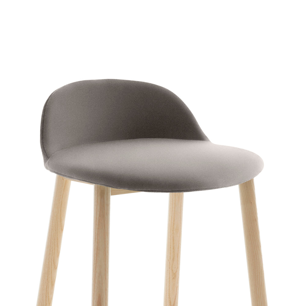 “Low back Alfi Chair with soft fabric slipcover, designed by Jasper Morrison for casual and refined interiors.”