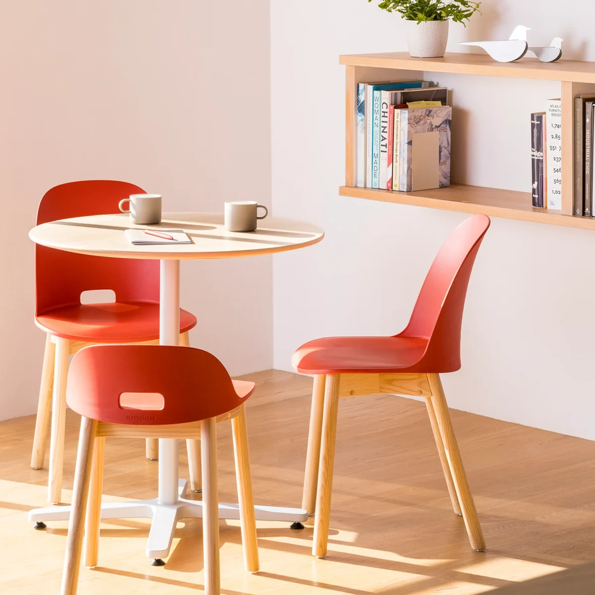 The Alfi Chair by Emeco, designed to add sophistication and comfort to any room.