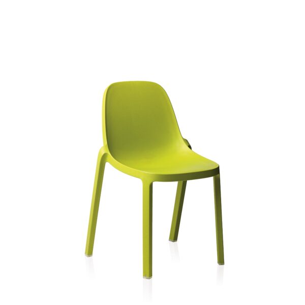 “Broom Chair by Philippe Starck for Emeco offering a one-piece silhouette with ergonomic curves and eco-friendly appeal.”