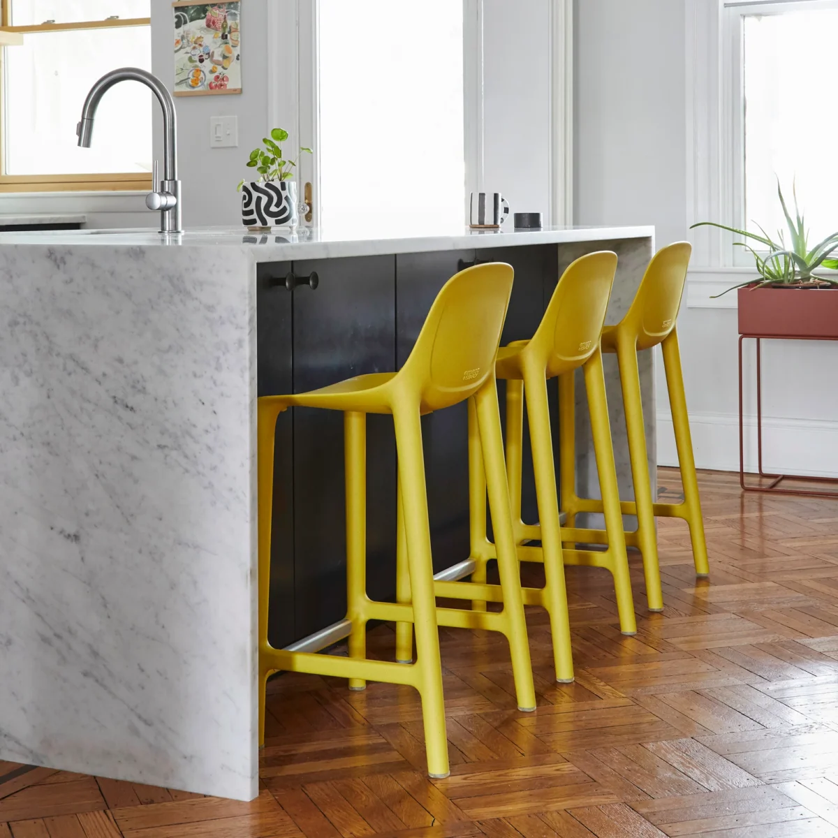 Emeco Broom Stool, offering a refined, functional design perfect for modern environments.