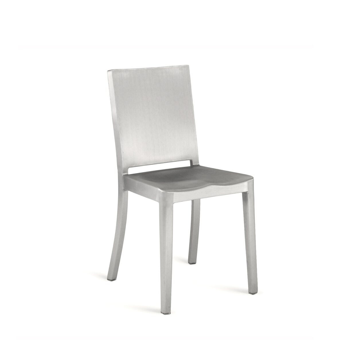 Philippe Starck's Hudson Chair by Emeco, a minimalist masterpiece featuring an industrial aluminum frame, designed for both style and durability.