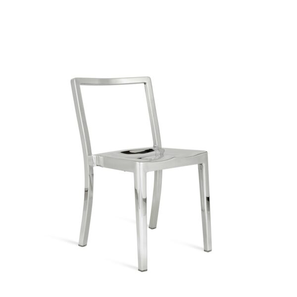 “Icon Chair by Philippe Starck for Emeco, crafted from recycled aluminum with a minimalist silhouette.”