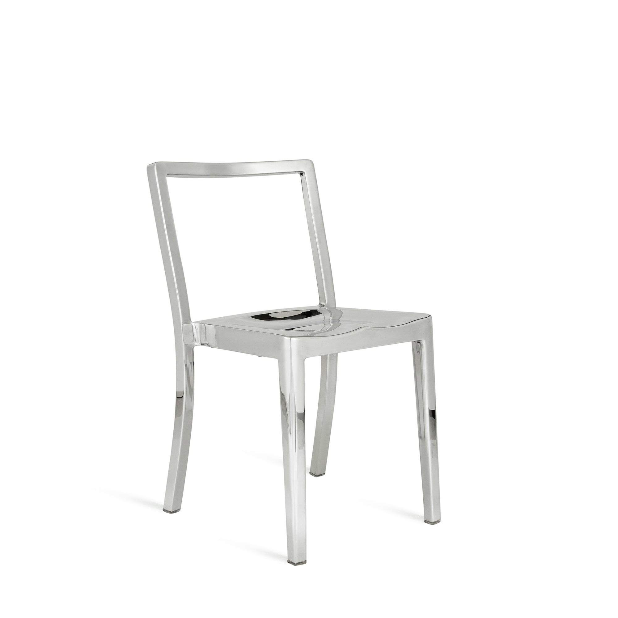 “Icon Chair by Philippe Starck for Emeco, crafted from recycled aluminum with a minimalist silhouette.”