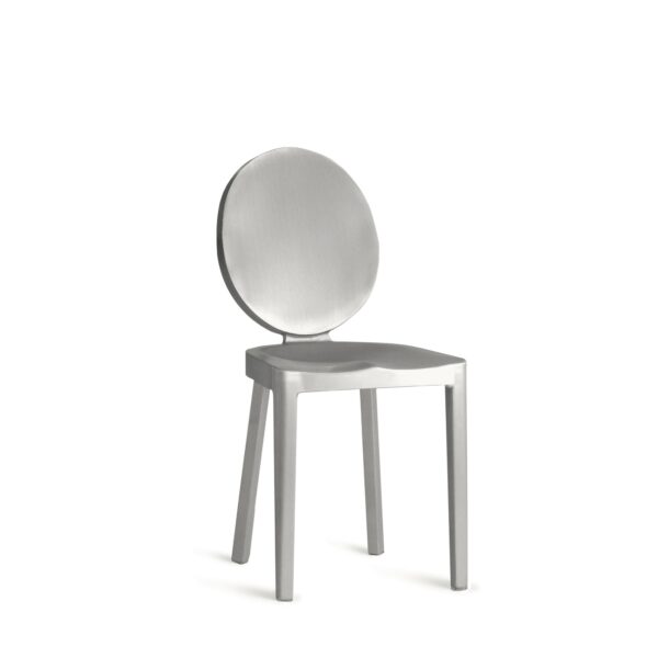 “Kong Chair by Philippe Starck for Emeco featuring a dramatic high back and gracefully curved arms in aluminum.”