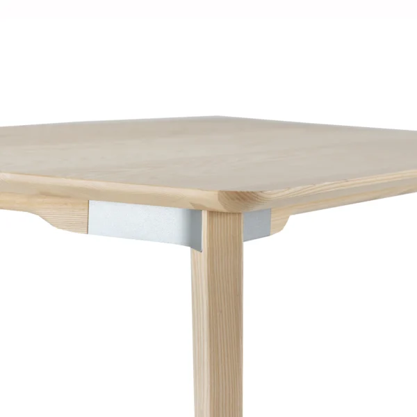 Lancaster dining table with light gray aluminum connectors and natural ash wood top by Emeco, designed by Michael Young, suitable for residential and commercial use.