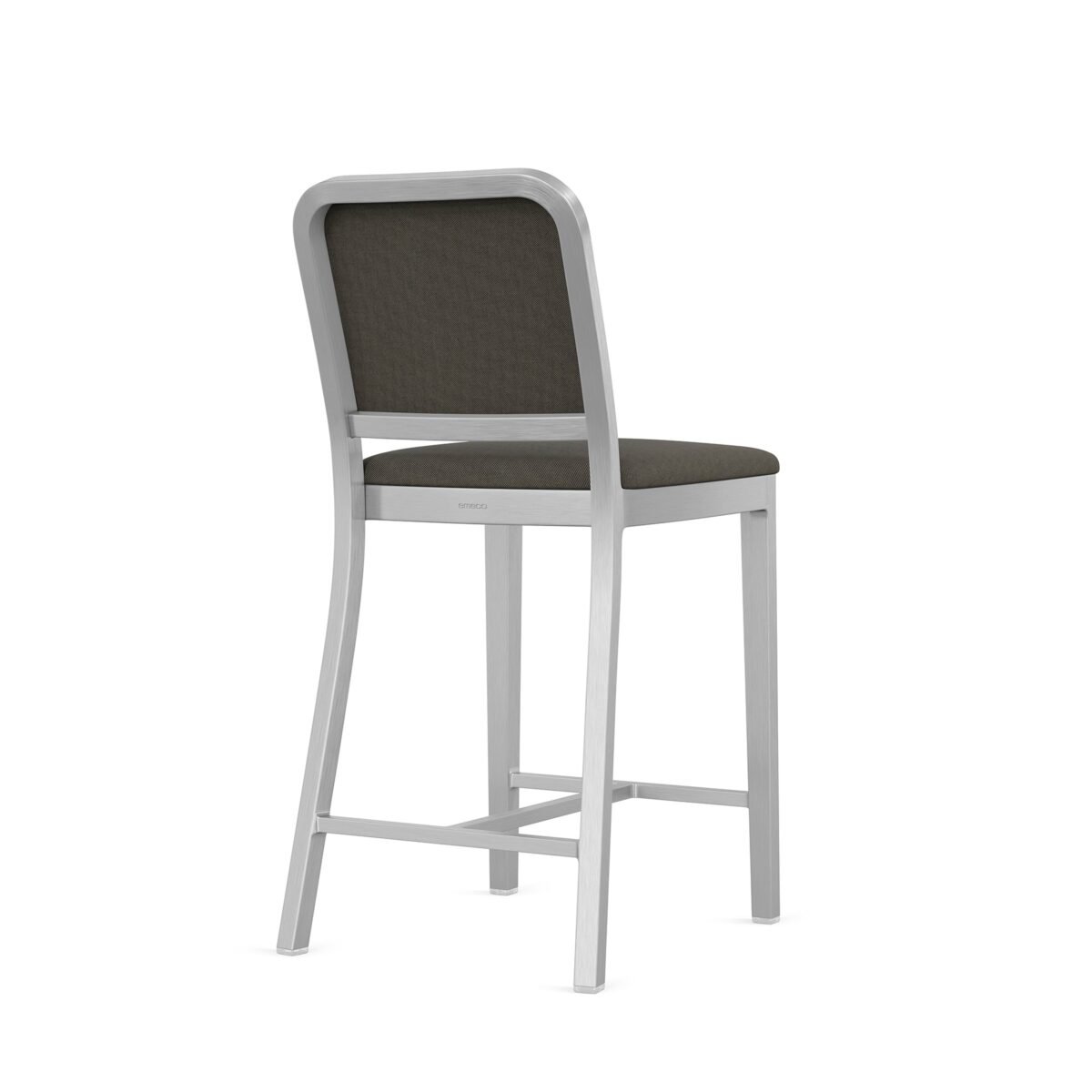 “Upholstered Navy Officer Stool by Emeco, combining luxury seating with industrial heritage.”