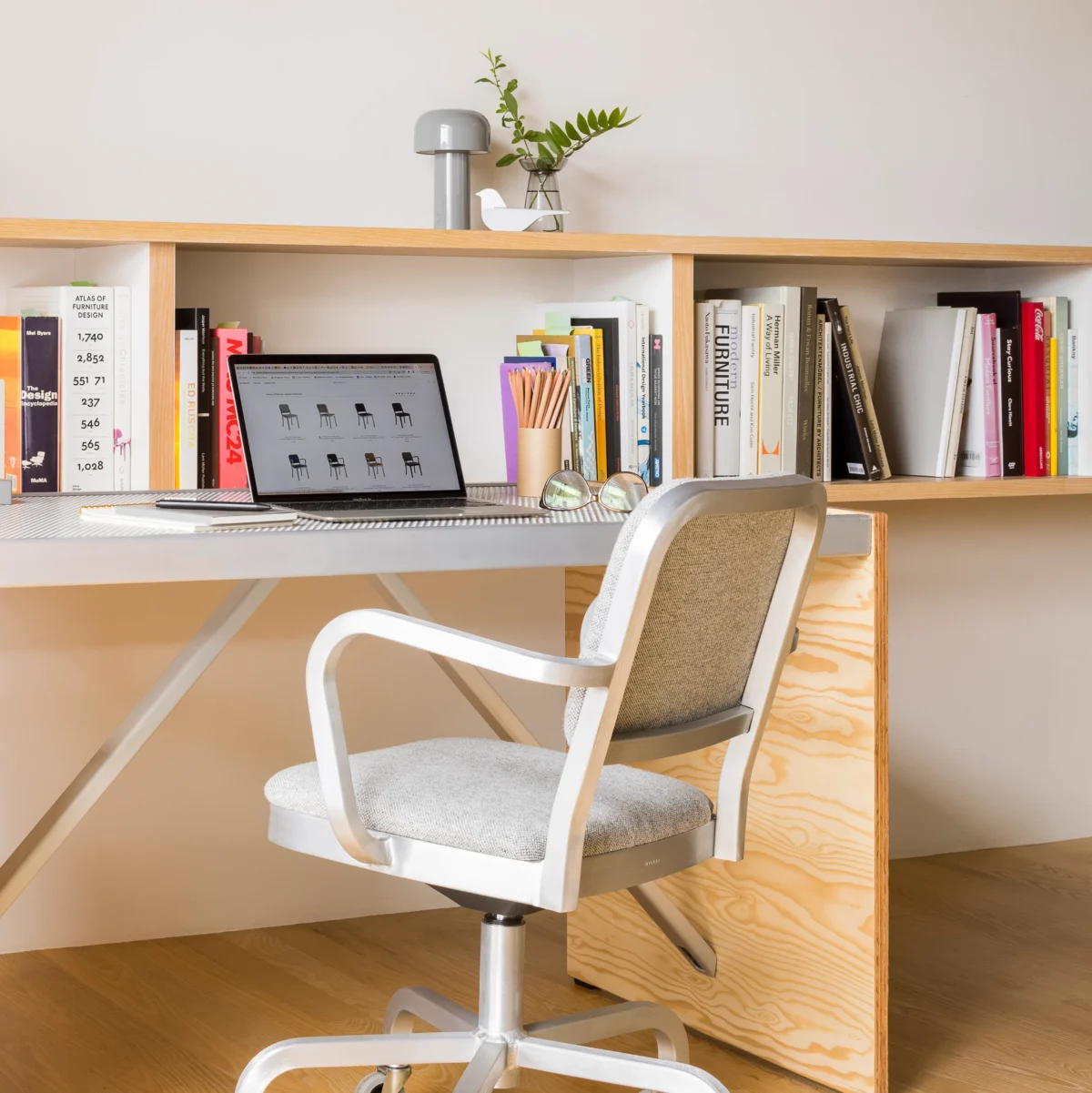 Navy Officer swivel armchair by Emeco – sophisticated, ergonomic design for Birmingham interiors.