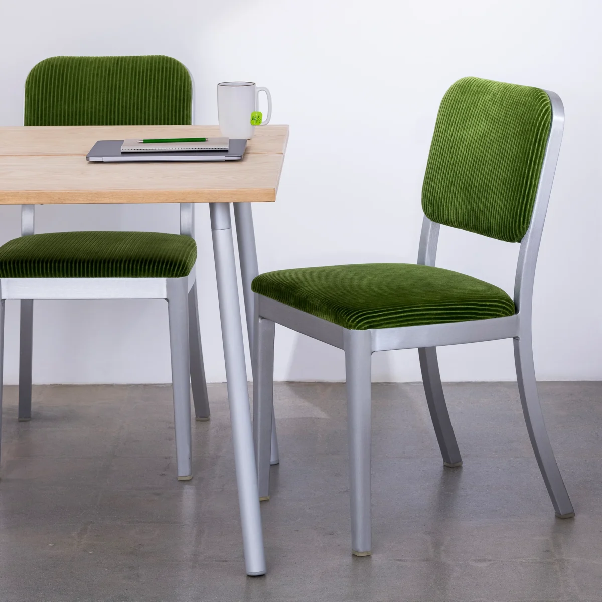 Durable aluminum side chair with contemporary design by Jasper Morrison for Emeco.