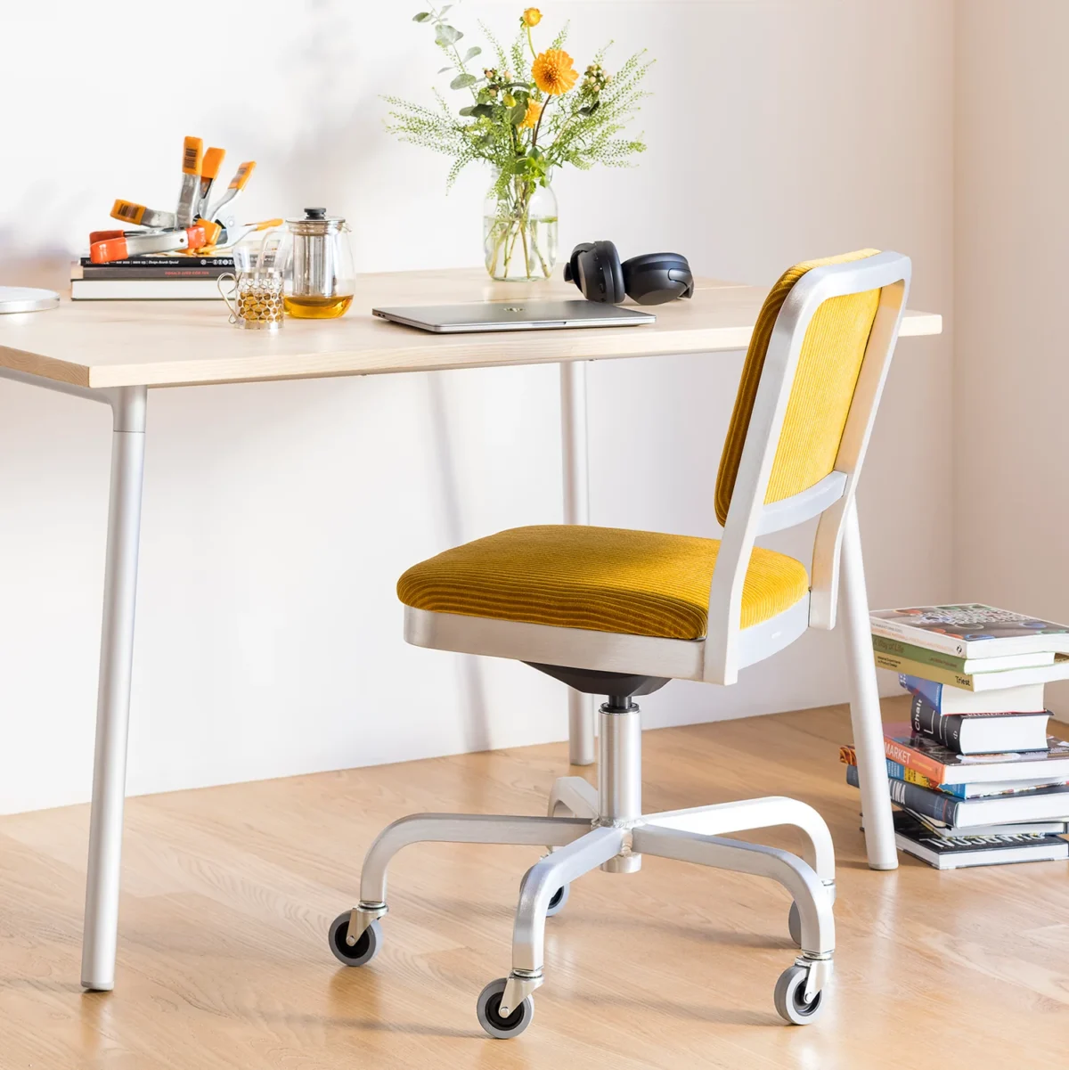 Navy Officer swivel armchair by Emeco – modern luxury seating for stylish homes in Royal Oak.