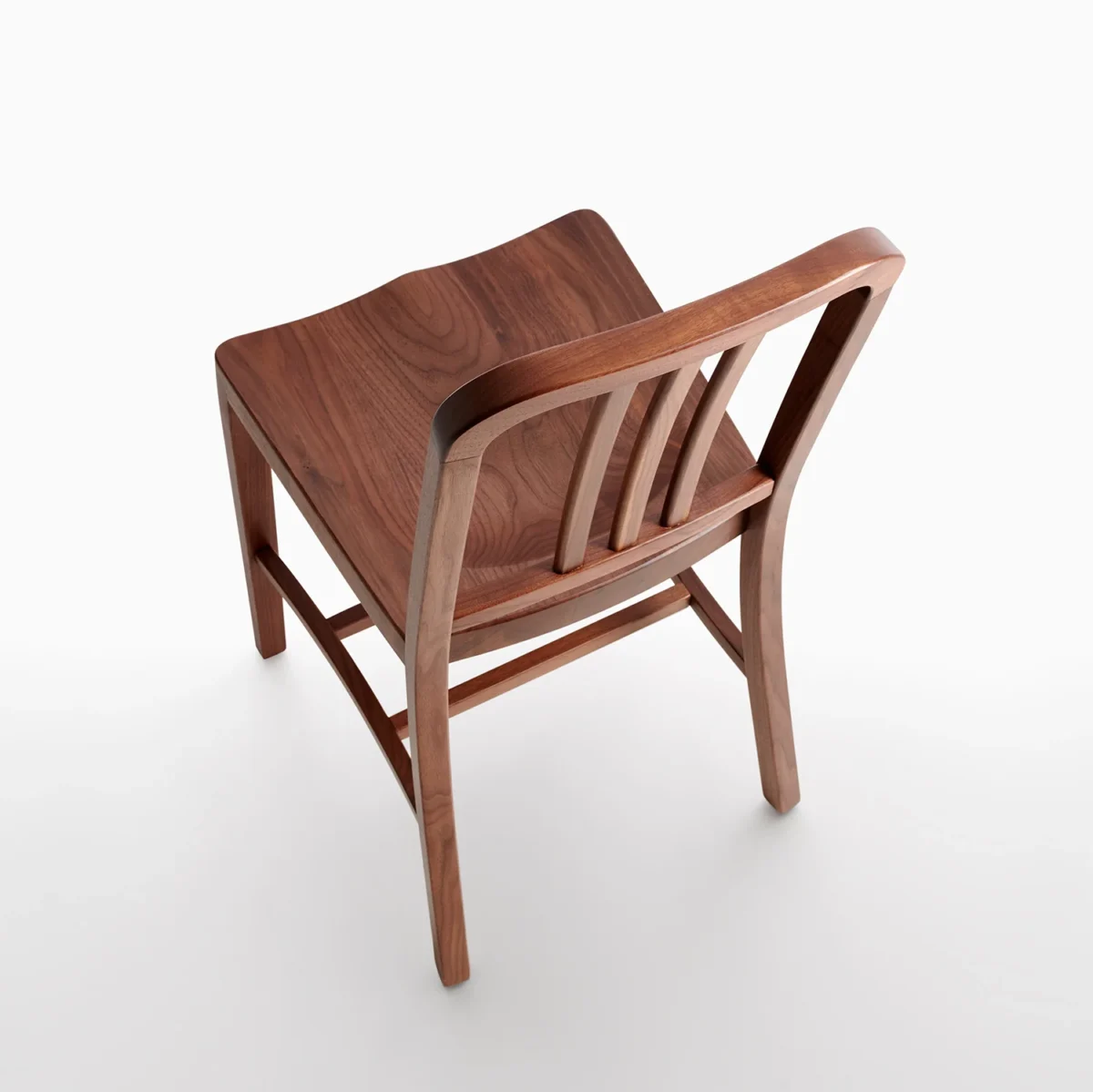Durable Navy Wood Chair with wood backrest and metal legs by Emeco.