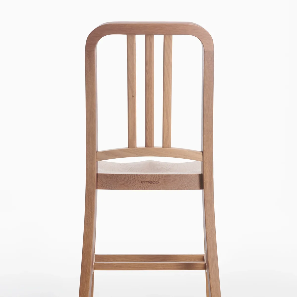 Navy Wood Chair with minimalist design and natural wood accents by Emeco.