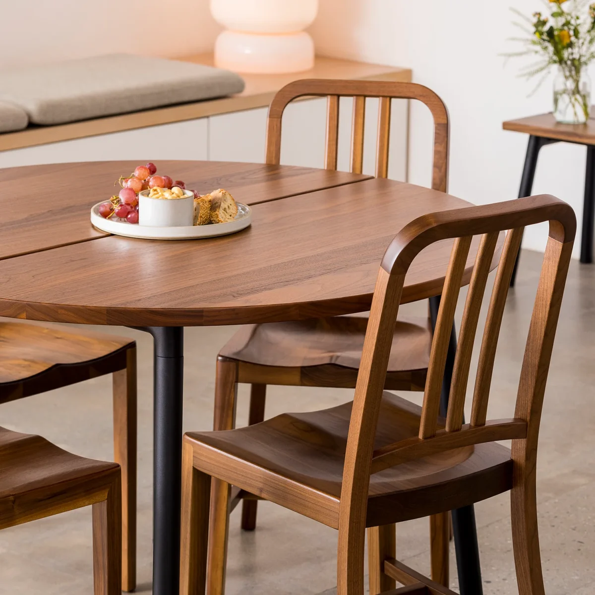 Elegant Navy Wood Chair featuring a wood seat and modern metal frame by Emeco.
