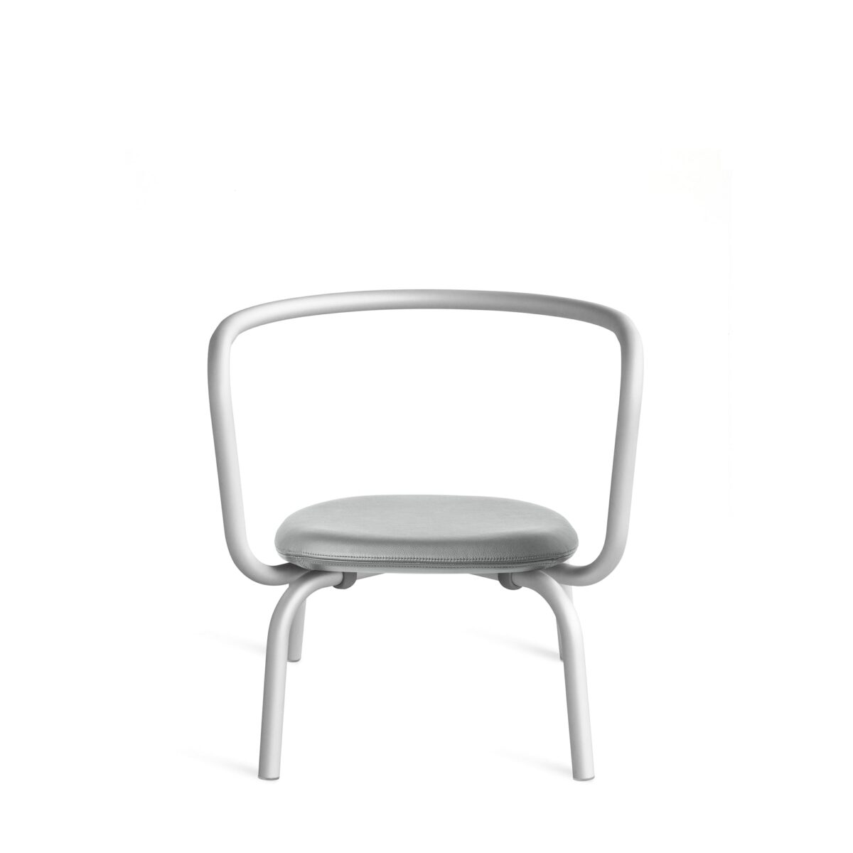 Parrish Lounge Chair by Konstantin Grcic featuring a red powder-coated frame and black leather seat.