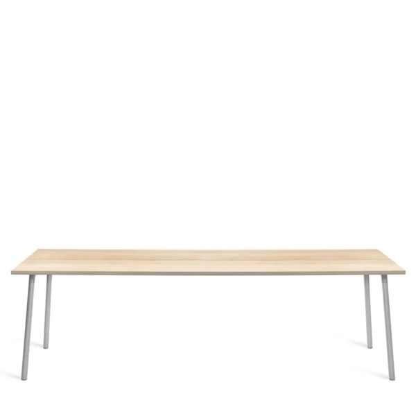 Run table with wood top by Emeco, designed by Sam Hecht and Kim Colin, features a recycled aluminum frame and wood top, suitable for indoor and outdoor use.