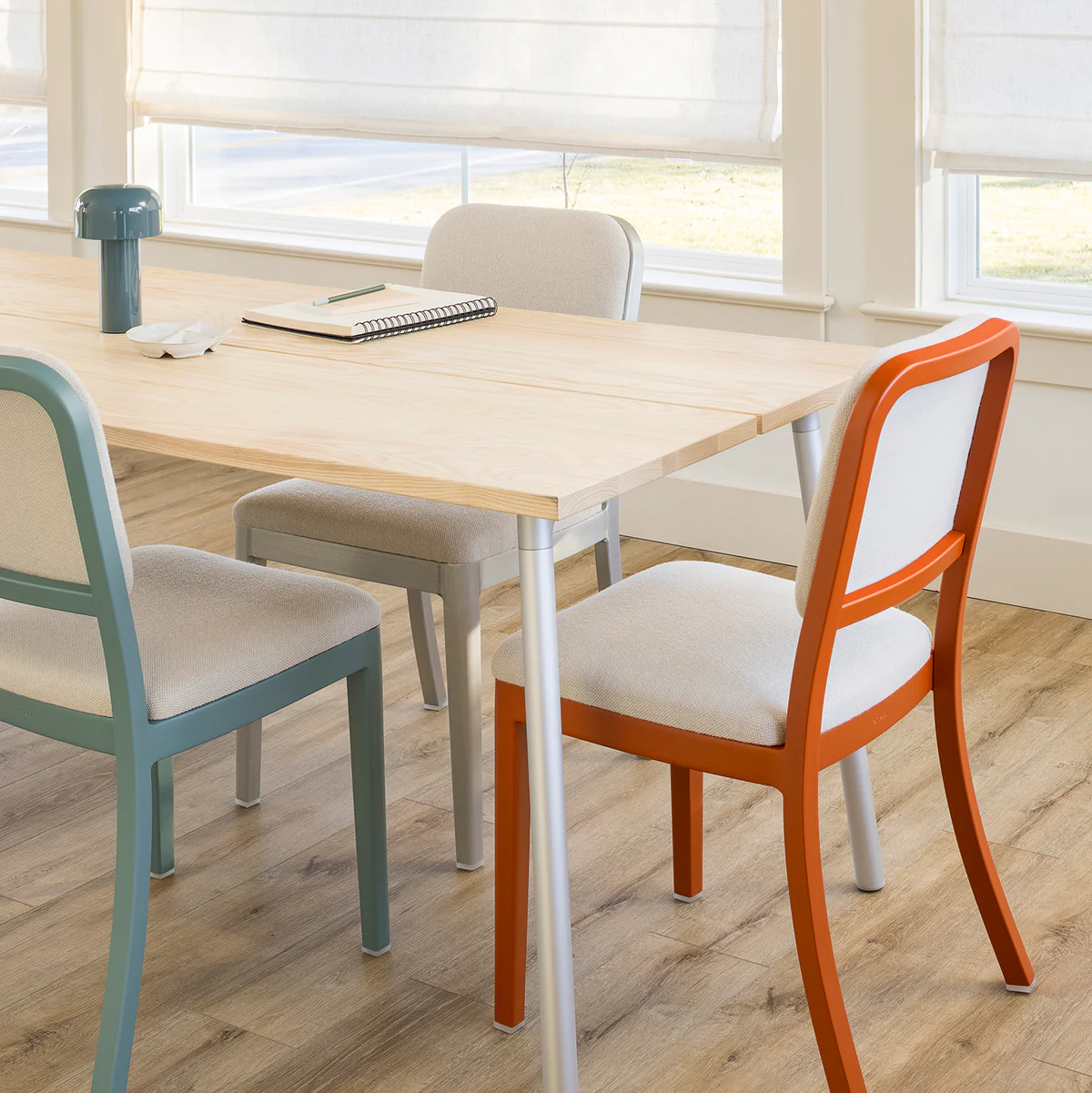 Navy Officer Armchair by Emeco, a stylish and durable design with comfortable armrests, perfect for adding a touch of classic elegance to modern interiors and office spaces.