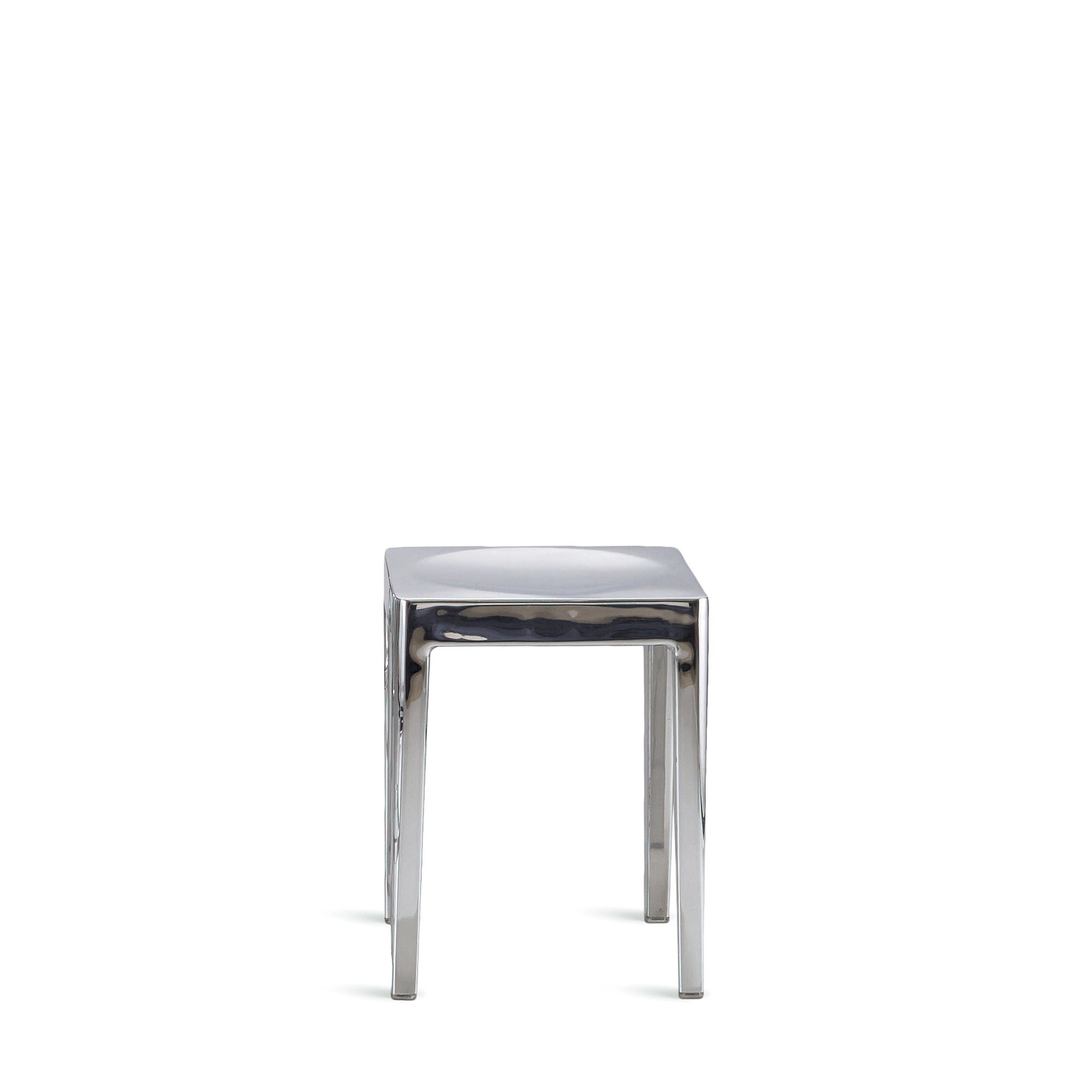 “Emeco Small Stool with clean lines and sturdy build, designed by Philippe Starck for versatile use.”