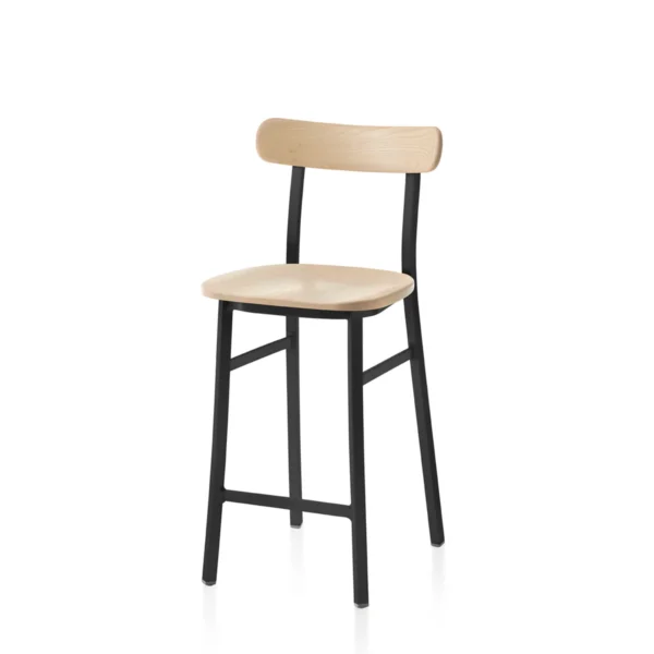 Utility Stool with black powder-coated aluminum frame and Accoya wood seat by Emeco, designed by Jasper Morrison, combines minimalist design with sustainable materials, suitable for both indoor and outdoor use.