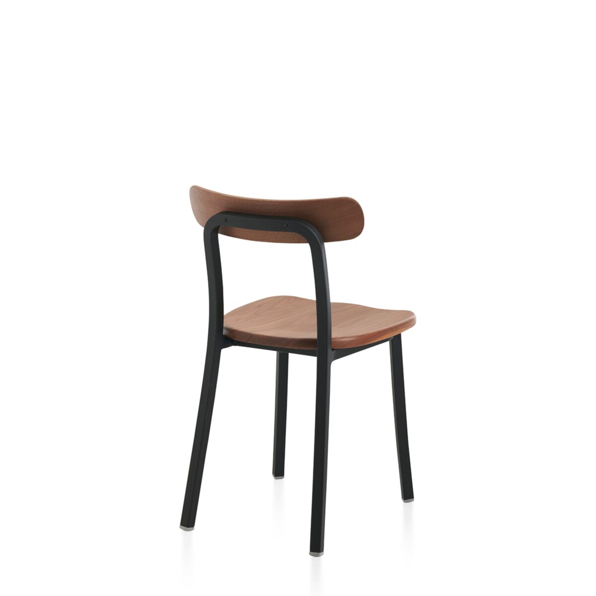 “Utility Side Chair by Jasper Morrison for Emeco, featuring a simple, stackable design made from recycled materials.”