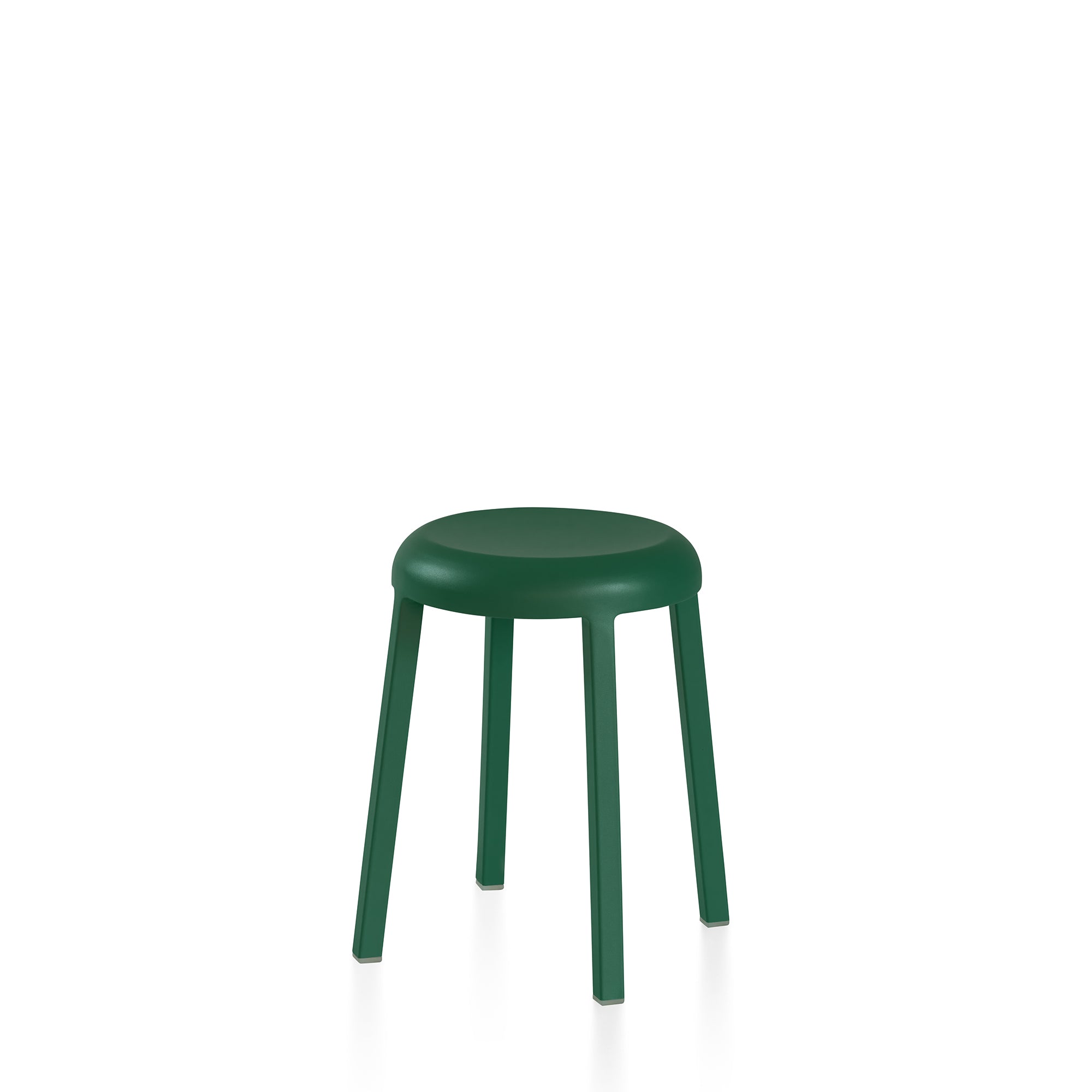 “Compact Za Stool by Emeco, designed by Naoto Fukasawa with a smooth, geometric shape and refined industrial finish.”