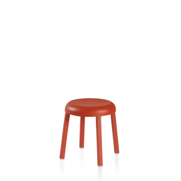 "Compact round stool with a convex seat and four tapered legs, handcrafted from recycled aluminum in a light blue finish by Emeco."