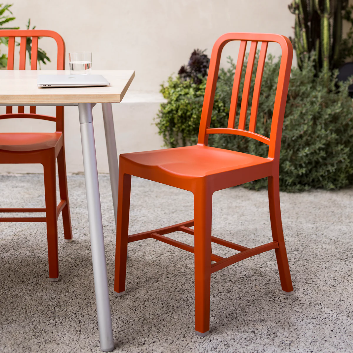 111 Navy Chair® by Emeco, a sustainable and durable design made from 111 recycled plastic bottles, combining modern style and eco-friendly materials for contemporary spaces.