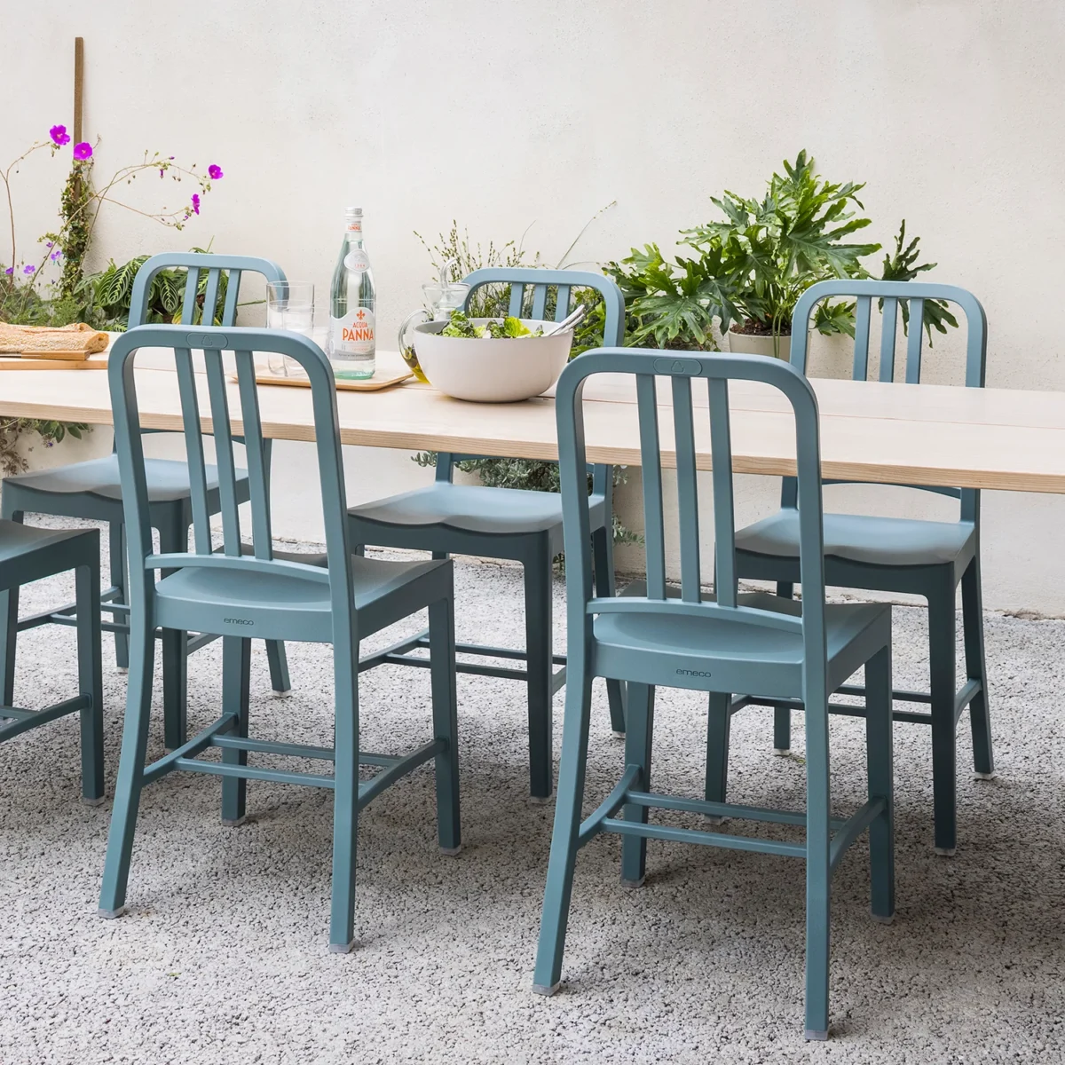 Contemporary aluminum chair with comfortable seating by Jasper Morrison for Emeco.