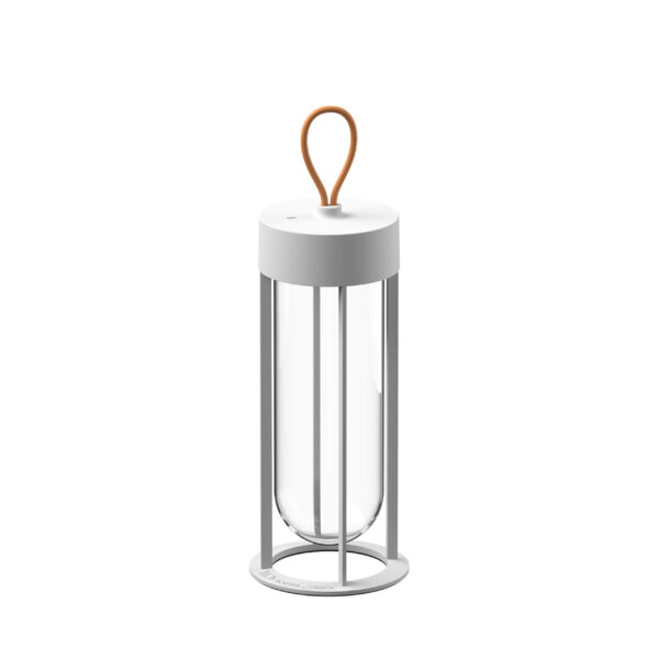 In Vitro Unplugged by Flos featuring a sleek tubular frame with enclosed frosted diffuser and cordless design.