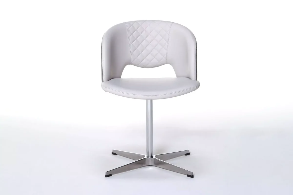 Peressini Fashion Q dining chair with a sleek, modern design, upholstered in premium leather or fabric, and supported by a customizable metal base available in various finishes.