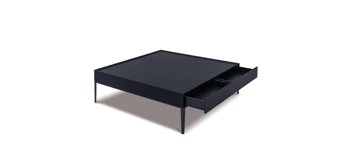 Elegant round dining table with smooth wood top and sleek metal base by Camerich.